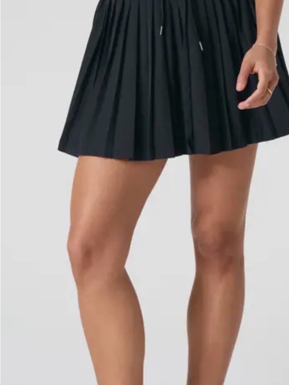 44. Vuori Black Pleated Mini Skirt